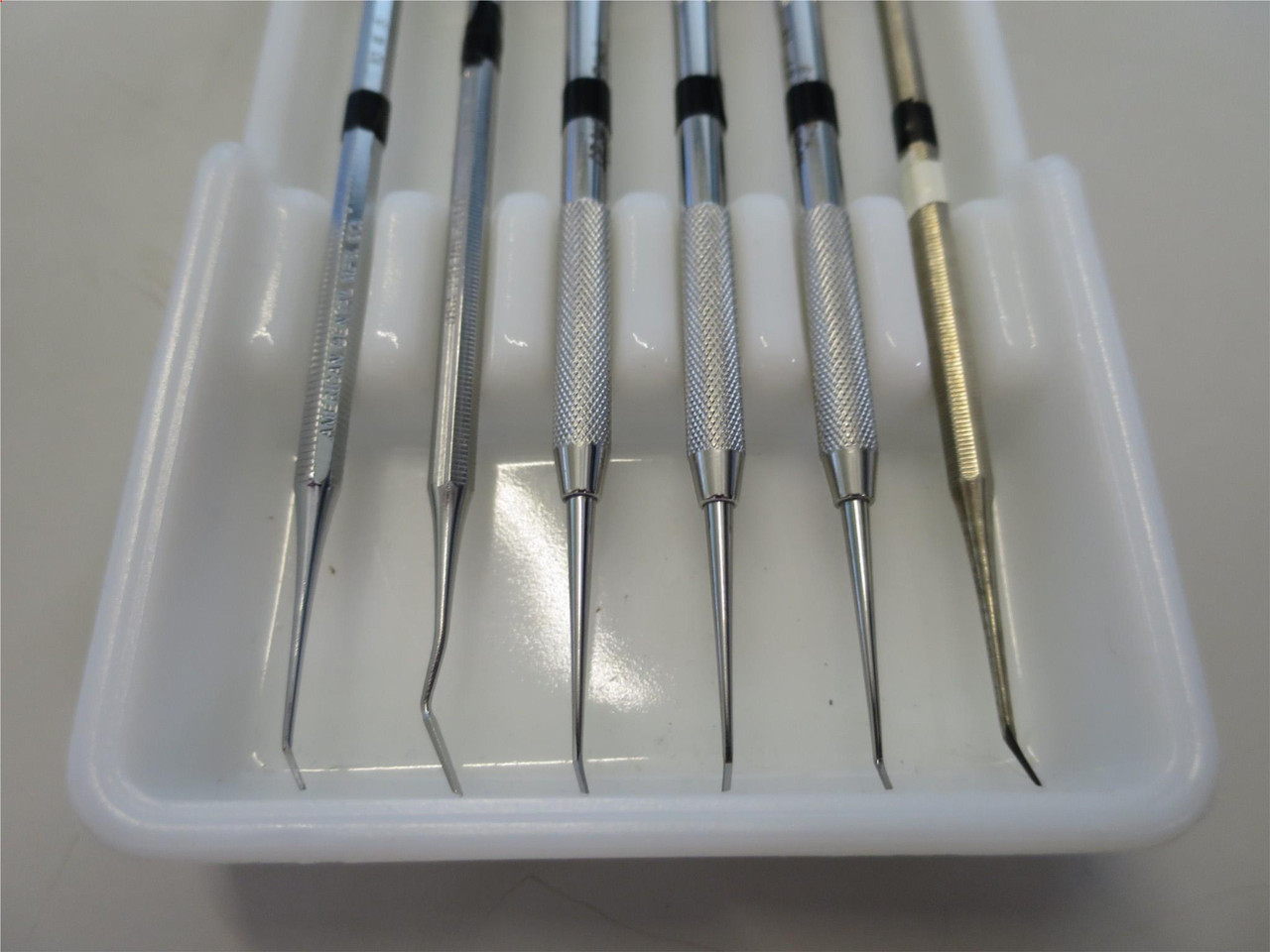 Set of 6 Stainless Steel Angle Dental Instruments w/Antique Milk Glass Tray