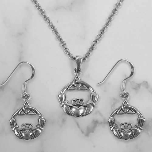 Sterling Silver Triquetra Claddagh Necklace & Earrings on background