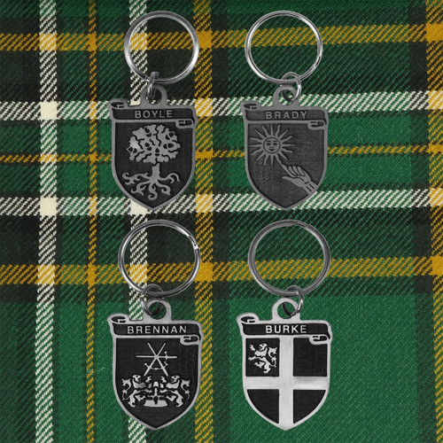 4 coat of arm key chains on tartan