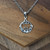 Sterling Silver Triquetra Claddagh Necklace on wooden display