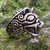A bold handcrafted ring featuring a detailed bear motif, available in bronze