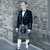 Man wearing a complete full formal prince charlie rental outfit with an Outlander Kilt