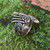A handcrafted Norse ring available in bronze or sterling silver, featuring detailed depictions of Odin’s ravens Huginn and Muninn. Symbolizing wisdom, thought, and memory, this artisan-crafted piece connects the wearer to Viking heritage and Norse mythology.