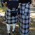 man in kilt with woman in skirt