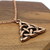 Copper triquetra necklace featuring a rustic Celtic Trinity Knot design.