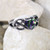 Mystic Crystal Celtic Knot Heart Ring with heart-shaped rainbow cubic zirconia.