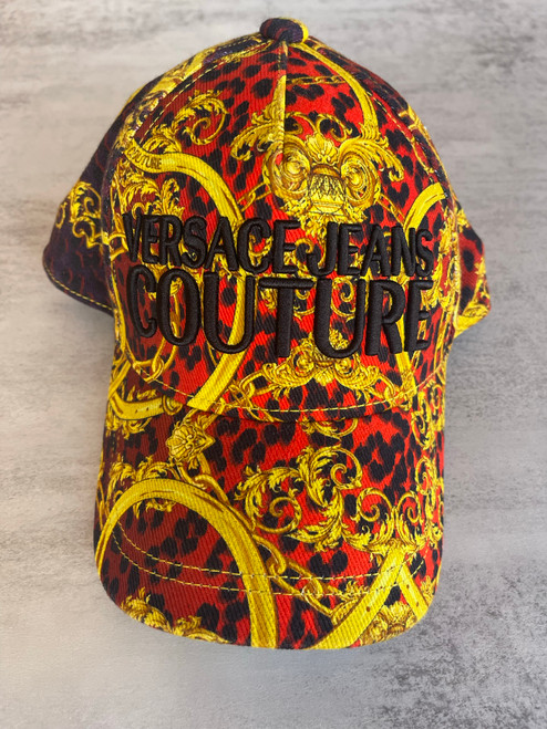 Versace Jeans Couture Cap front in gold yellow & deep orange baroque print & black logo embroidered on crown