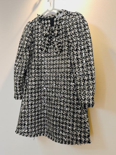 Zara Long Sleeve Sequin Houndstooth Mini Dress angled hanging front view in black & white with frayed hem and cuffs