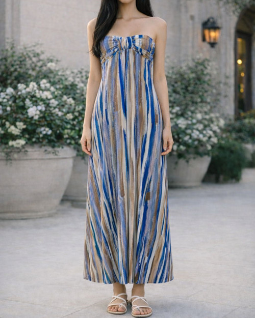 GodDiva London Blue Strapless Maxi Dress front view on model with ruched bust, strapless neck & soft pleats on bodice