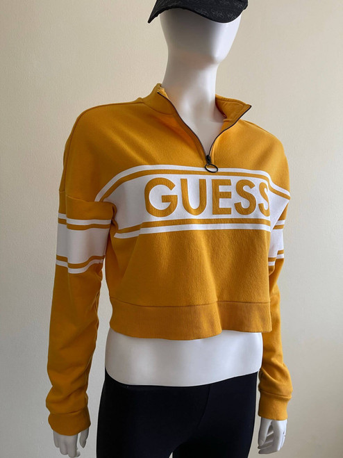Guess Yellow Logo Crop Sweater Side angle with  long sleeves, cropped length & raised collar