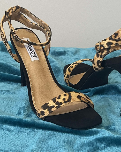 Madison Leopard Print Heel Sandals angled front with black soft toe bed, tan insoles & mid height black heel