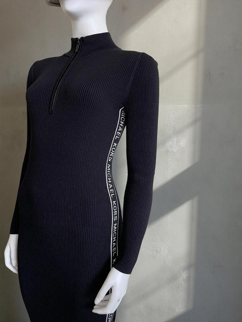 Michael Kors Black Knit Logo Midi Bodycon front angled in ribbed texture, white vertical Michael Kors logo side tape