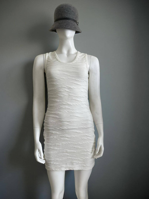 Olive De Olive White Bodycon Dress front view wavy texture, sleeveless cut & sculpted fit.