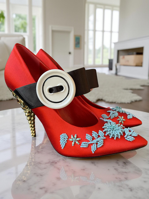 Prada Mary Jane Red Satin Heels side profile with sculpted gold heels, blue beading around toes, & oversized white button