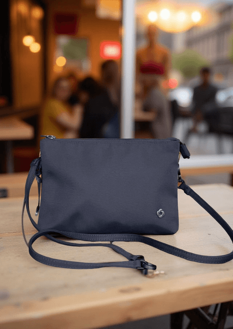 Samsonite Skyler Purple Crossbody Bag – front view in logo badge and matching crossbody strap