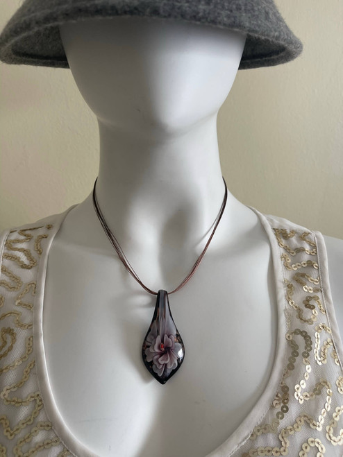 Glass Teardrop Pendant Necklace – front view worn on mannequin, teardrop shape with pink floral flower design & black outline