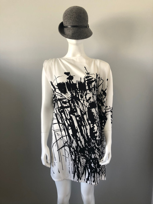 Black & White Graffiti Mini Dress – full front with 1 short & 1 long draped sleeve in white base with black graffiti details
