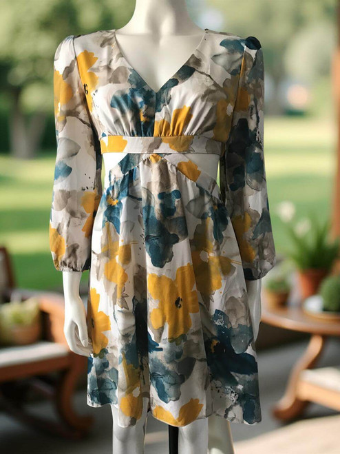 Floral Cut Out Mini Dress – front view in white base with blue, yellow, grey florals, V-neck, under-bust band