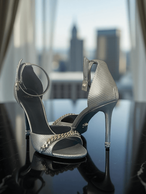 Versace Chain Detail Metallic Silver Heels front view in textured metallic silver with gold chain across the toe