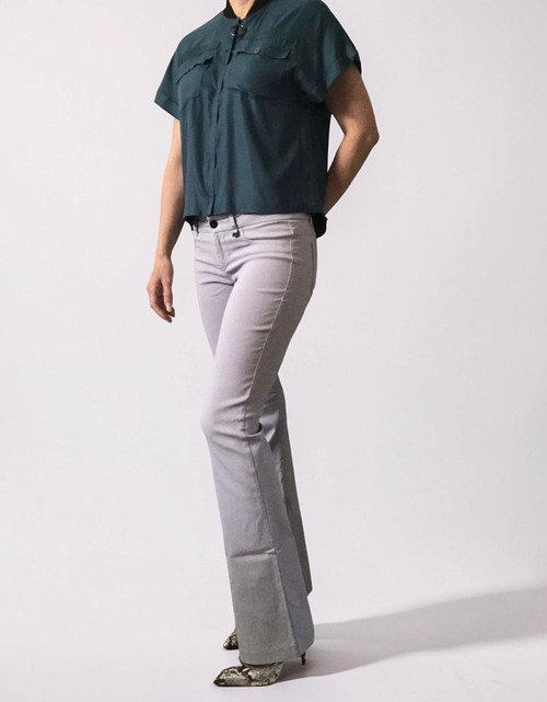 Sissy Boy light Grey Mid-Rise Bootleg Trousers – angled front view on model with fitted waist, slim thigh & bootleg leg