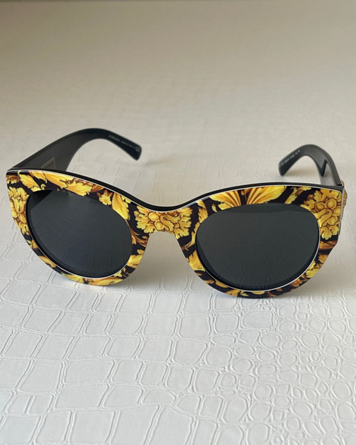 Versace Tribute Yellow Barocco Print Sunglasses from view with lack & yellow baroque pattern & dark tinted lenses