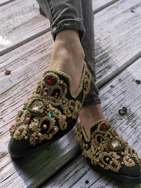 Jeffrey Campbell Black Jewelled Loafer lifestyle shot front view with gold embroidery across the entire upper