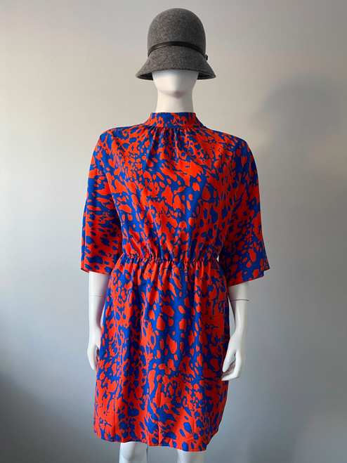 Blue & Orange All-Over Print Mini Dress front view with slightly elevated collar, loose fit split sleeves & mini above knee length