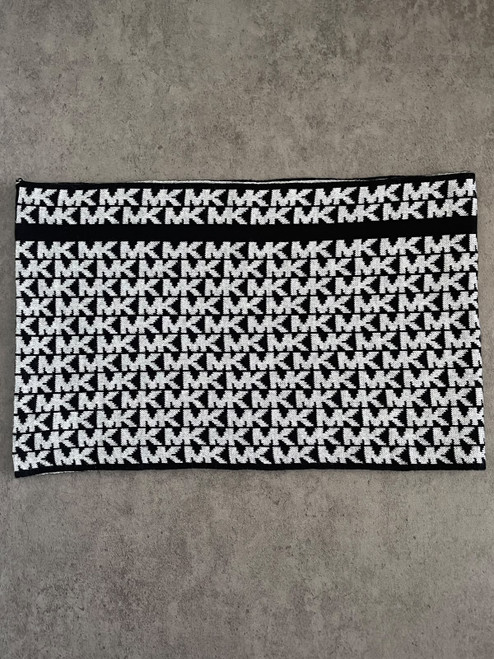 Michael Kors Black & Grey MK Monogram Knit Snood folded flat lay with black MK repeating monogram on black