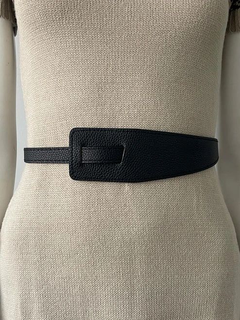 Black Faux Leather Buckleless Waist Belt front view on mannequin with wider belt styled on the left