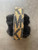 Michael Kors Earmuffs top view showing MK woven logo pattern along the headband