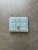 Colette Hayman Baby Blue Bi-Fold Purse front showing quilted exterior with silver tone logo