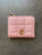Colette Hayman Baby Pink Bi-Fold Purse front view showing quilted pink exterior with gold tone logo detail