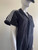 Adidas Fiorucci Black Boiler Suit – side view with white shoulder 3 stripes and press stud close concealing the zip.