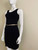 Cool Ice Black Sleeveless Belted Bodycon Mini Dress – angled front showing fitted silhouette & belt detail