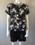 Edition Black Short Sleeve Floral Top front  showing floral pattern placement across bodice and sleeves