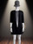 Fashion Union Neck Tie Black Mini Dress front view with loose long white ribbon necktie & 3/4 sleeves