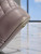 Gianni Versace Vanitas Lavender Leather Shoulder Bag close up base corner showing creased leather & scuff marks