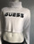 Guess White Fleece Long Sleeve Crop Sweater angled view with cropped hem, black chest logo & soft, white fleece fabric