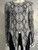 Guess Long Sleeve Grey Snake Print Knit Top front view with tie left loose, with long sleeves, stretch knit & snake motif