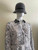 Karen Millen Grey Snake Print Shirt Mini Dress upper front with snake print & contrast grey collar, styled with a hat