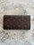 Louis Vuitton Monogram Trifold Wallet back view in smooth brown monogram canvas in very good condition