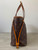 Louis Vuitton Monogram Canvas Neverfull PM right side showing shape & base structure & wear on leather drawstring
