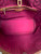Louis Vuitton Monogram Canvas Neverfull PM interior in Cerise / cherry red striped lining with visible signs of use