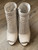 Michael Kors White Leather Peep Toe Boots front view, zips closed, symmetrical perforated panels & toe shape