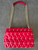 Michael Kors Red Leather Sloane Crossbody Bag back view with white quilted stitching, MK Logos & adjustable gold chain