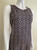 Oasis Geo Glitter Print Mini Dress angled front view highlighting side shaping, round neck & shoulder cut