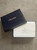 Prada Turquoise Leather Card Holder original black Prada box open with lid to side showing Prada glassine paper