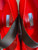 Prada Mary Jane Red Satin Heels innersoles view showing Prada white label, black straps & unworn condition