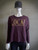 Woolworths RE: Denim Slogan Sweater front view in burgundy with gold “LOCAL” slogan across chest