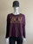 Woolworths RE: Denim Slogan Sweater front view in burgundy with gold “LOCAL” slogan across chest